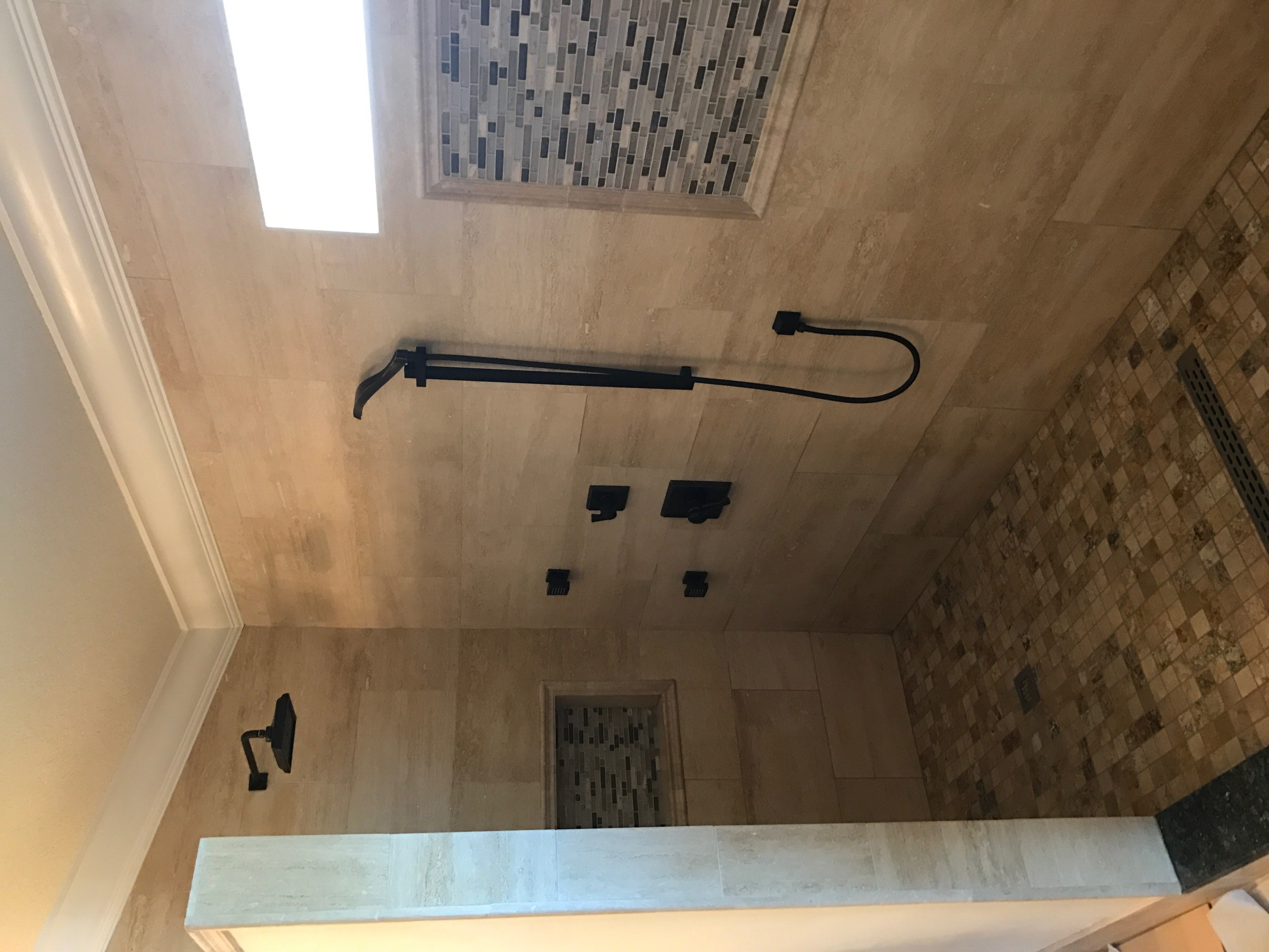 A finished custom shower from a bathroom remodel